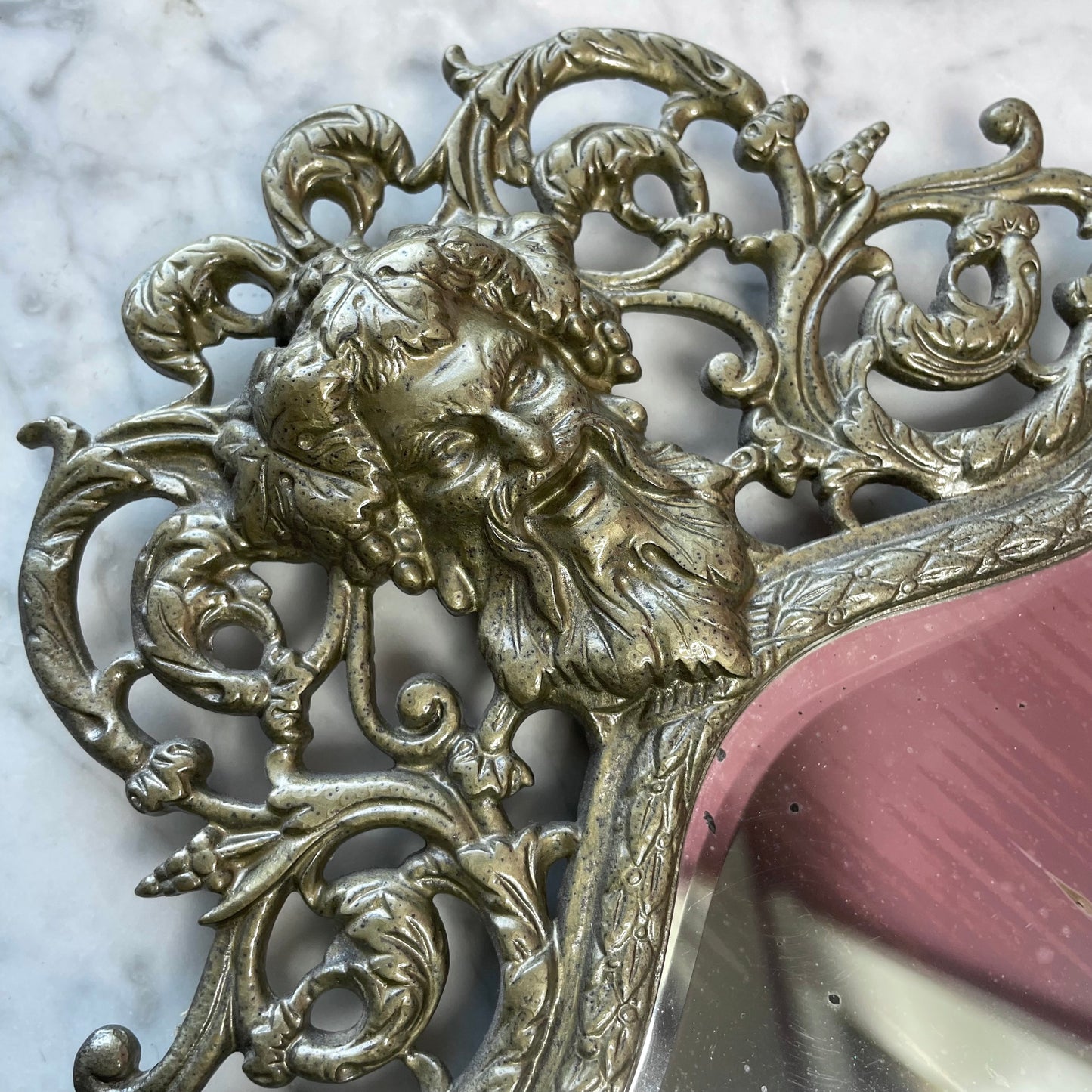 RESERVED Antique Bacchus Mirror