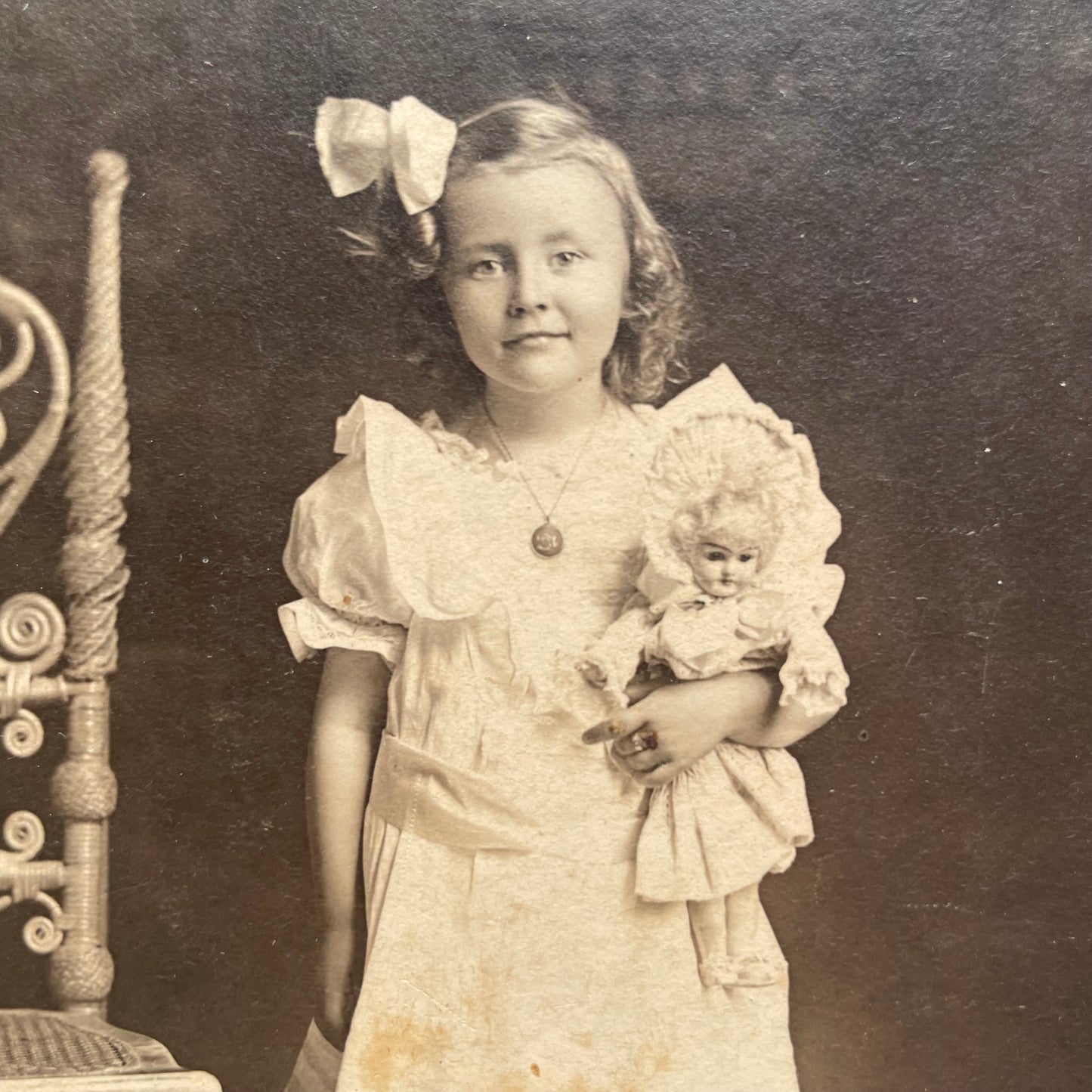 Antique Photo of Girl and Her Doll