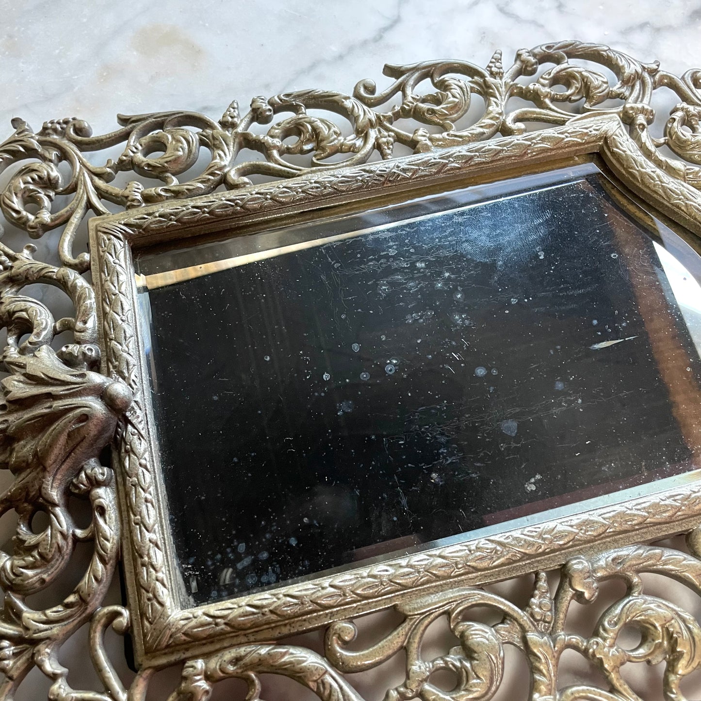 RESERVED Antique Bacchus Mirror