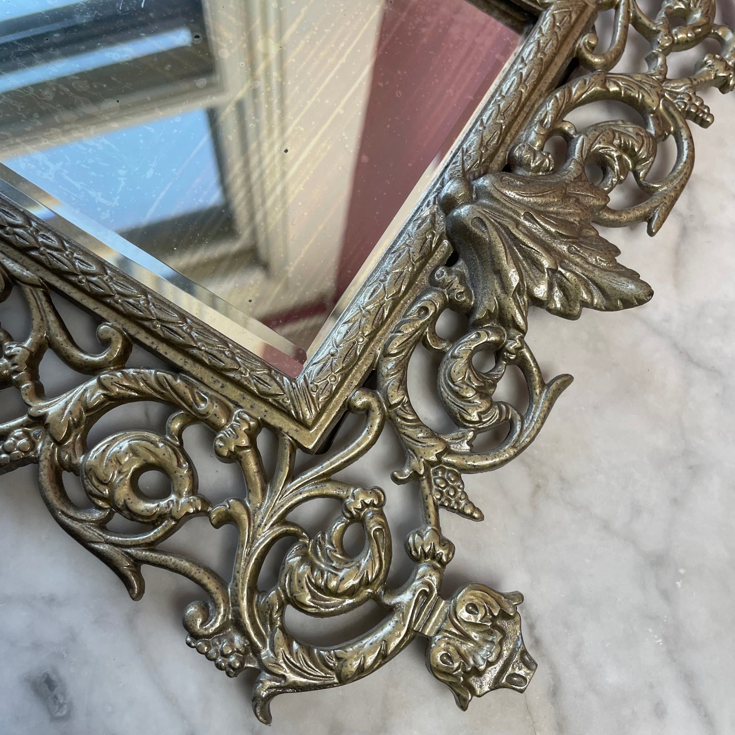 RESERVED Antique Bacchus Mirror
