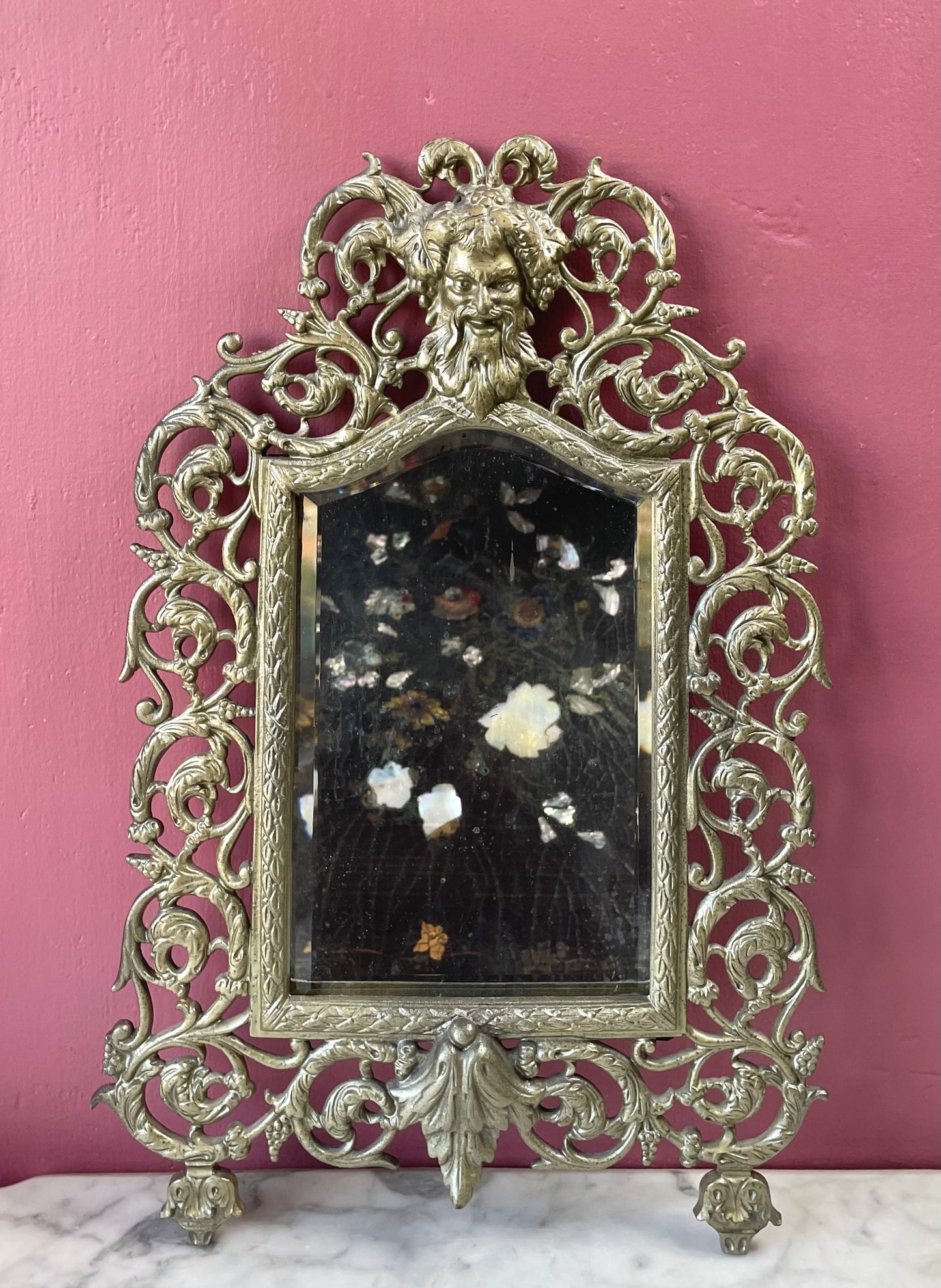 RESERVED Antique Bacchus Mirror