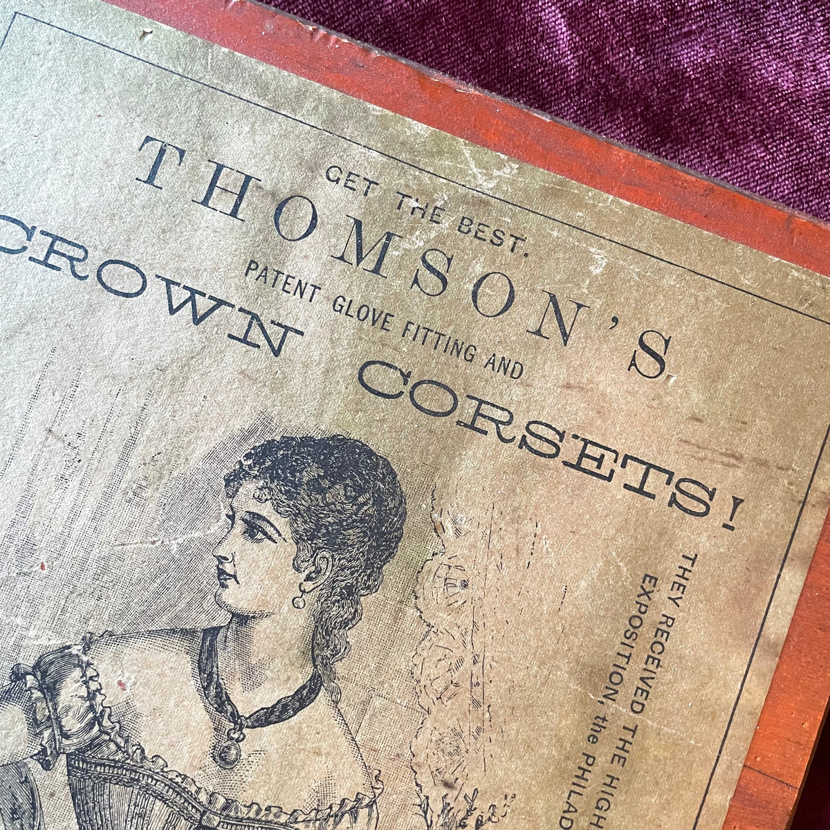 Victorian Corset Ad on Wooden Board