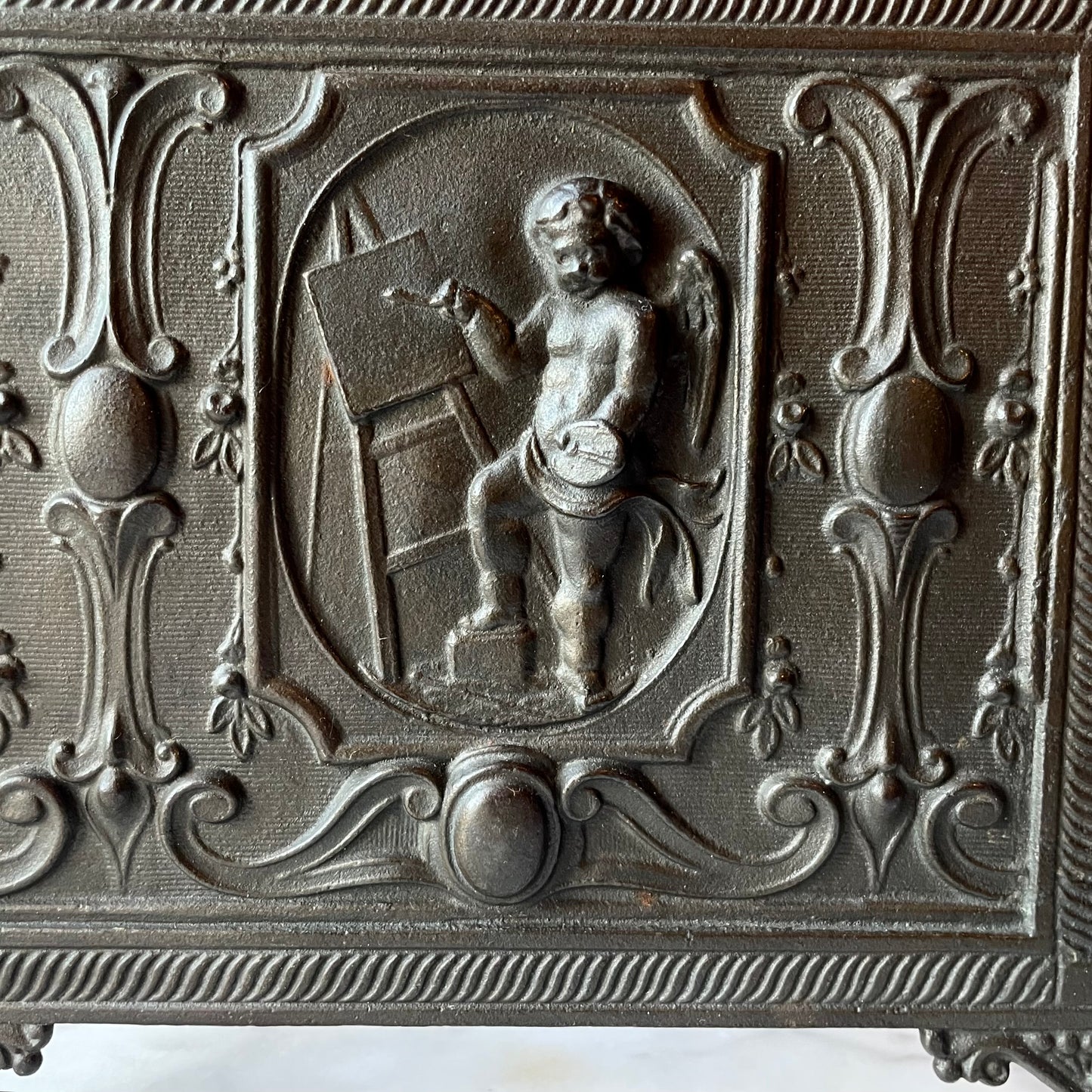 Antique Cupid Book Rack