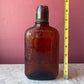 Antique Amber Spiderweb Whiskey Bottle | Four Roses