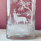 Antique Whiskey Bottle with White Enameled Deer