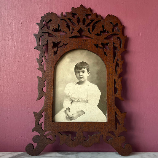 Antique Photo of Girl with Short Hair in Wooden Frame