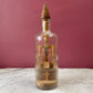 Antique Folk Art Bottle Assemblage with Crucifix on an Altar