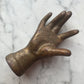 Victorian Cast Iron Hand Shaped Paperweight with Rings