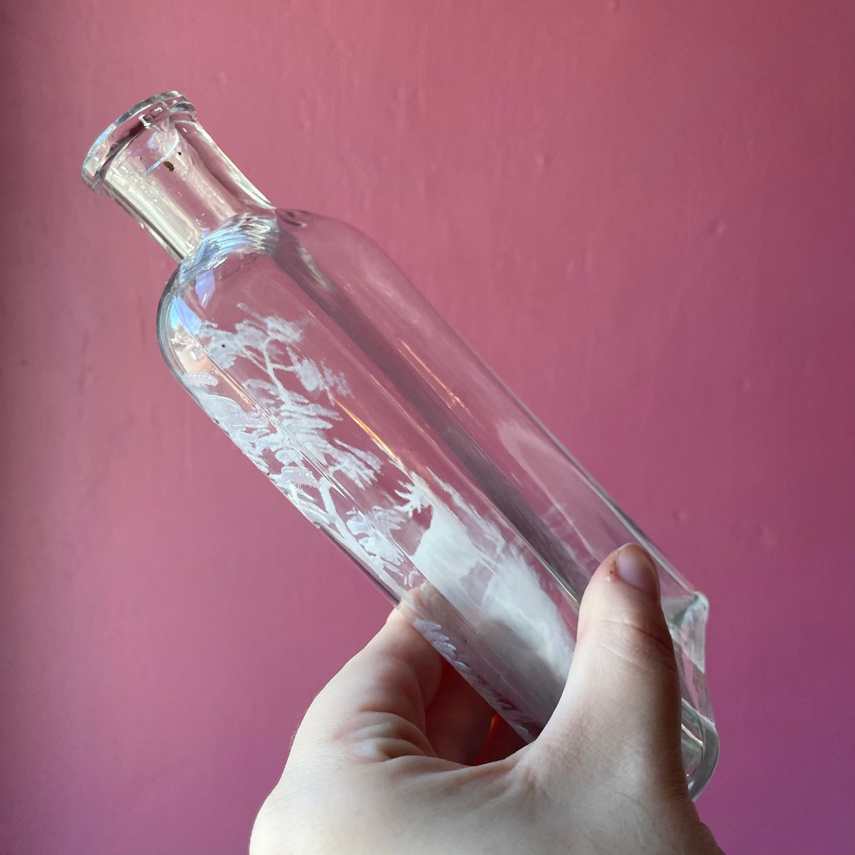Antique Whiskey Bottle with White Enameled Deer