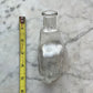 Antique Hand Shaped Glass Bottle