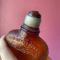 Antique Amber Spiderweb Whiskey Bottle | Four Roses