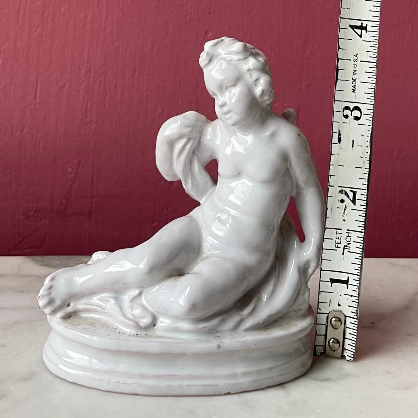 Vintage Reclining Cupid Figure