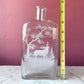 Antique Whiskey Bottle with White Enameled Deer