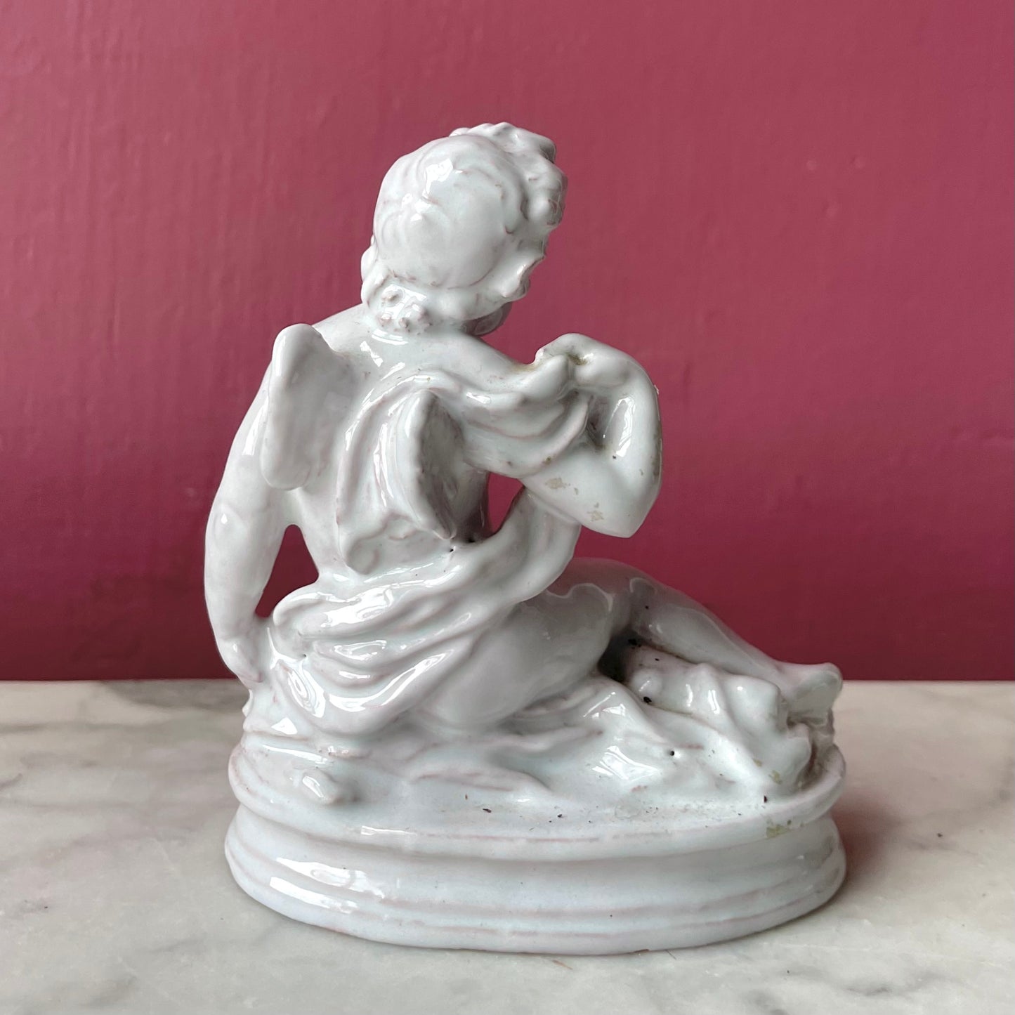Vintage Reclining Cupid Figure