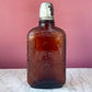 Antique Amber Spiderweb Whiskey Bottle | Four Roses