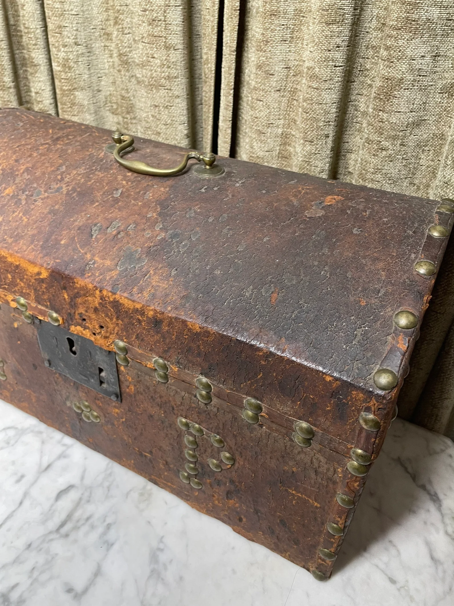 Victorian Leather Covered Trunk with Studs and Newspaper Lining